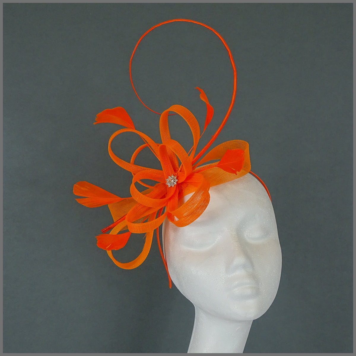 Delightful wedding fascinator mini hat, garden party the races. Orange ginger flowers unique millinery only online 1 made. Bridgeton retro feel.