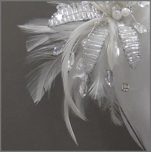 Elegant White Feather Fascinator with Crystal Flower
